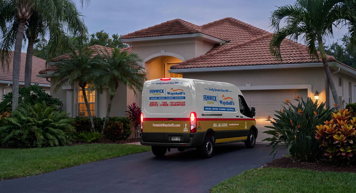 A Fenwick Waychoff's service van parked in a residential driveway at dusk, arriving to provide 24/7 emergency AC repair services.
