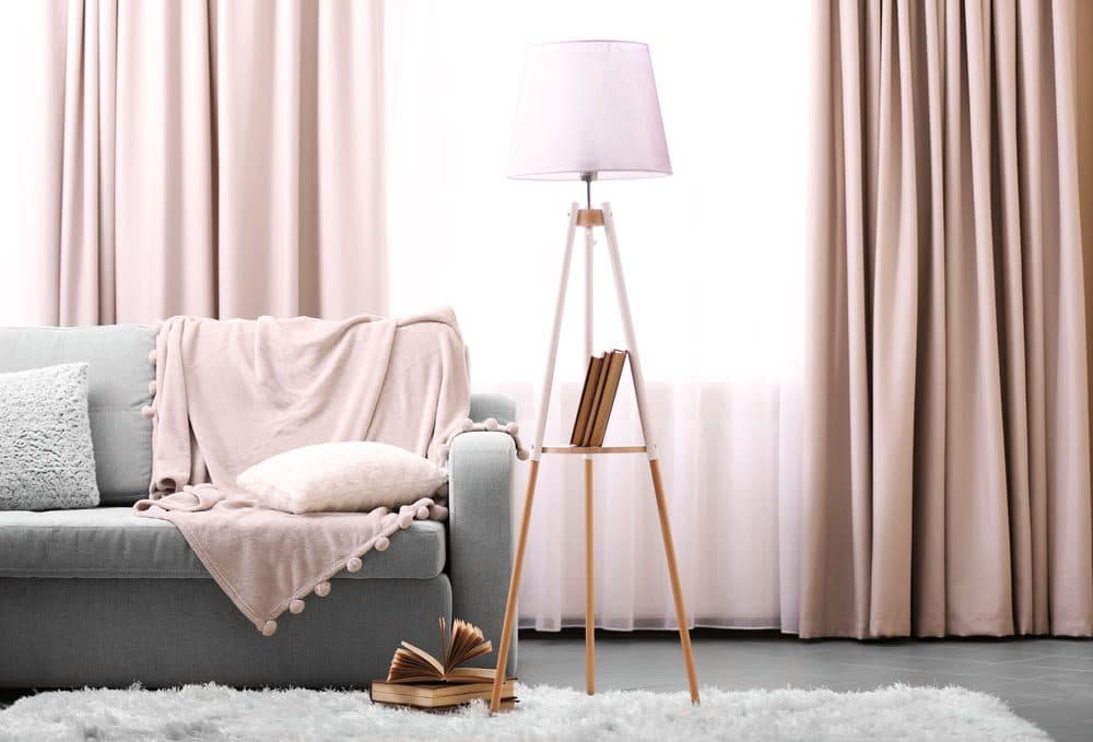 living room with rug and curtains